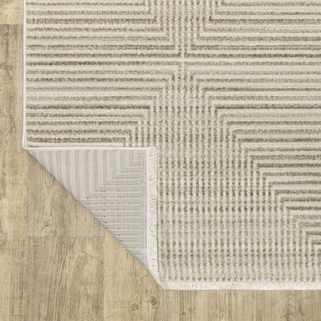 8' Ivory Beige Taupe And Tan Geometric Power Loom Runner Rug With Fringe