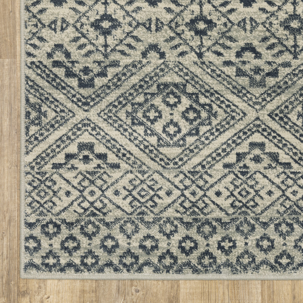 2' X 8' Blue And Beige Geometric Power Loom Stain Resistant Runner Rug