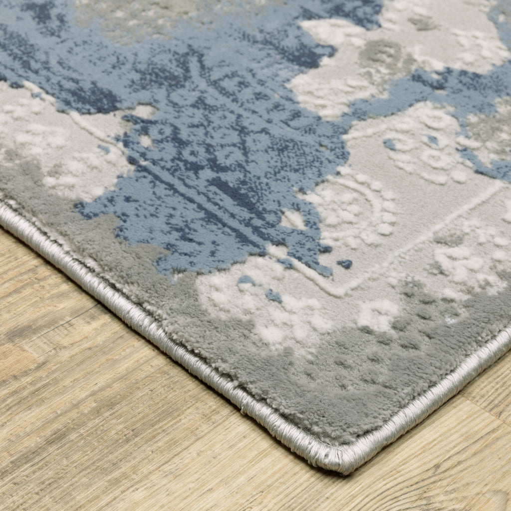 8' X 11' Grey Blue Ivory Navy Beige And Brown Abstract Power Loom Stain Resistant Area Rug