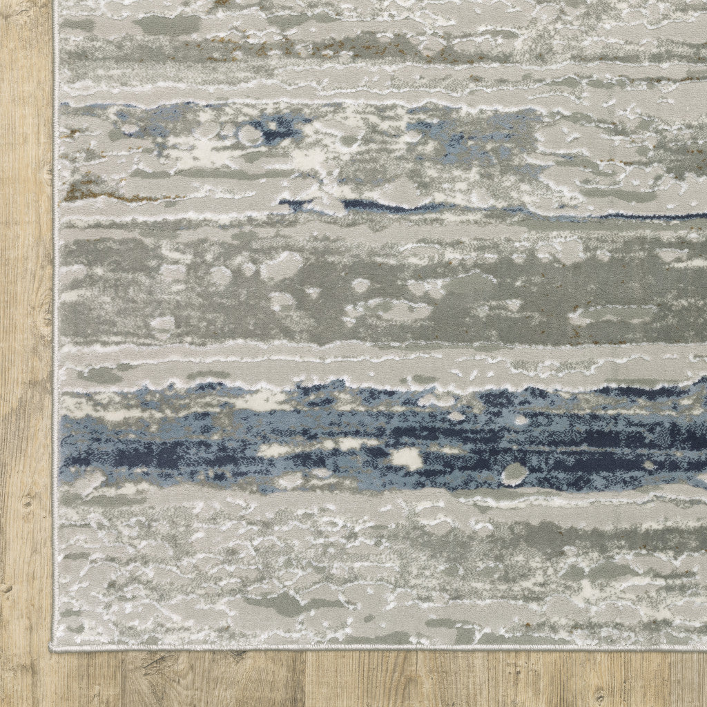 8' X 11' Blue Ivory Grey Light Blue And Brown Abstract Power Loom Stain Resistant Area Rug