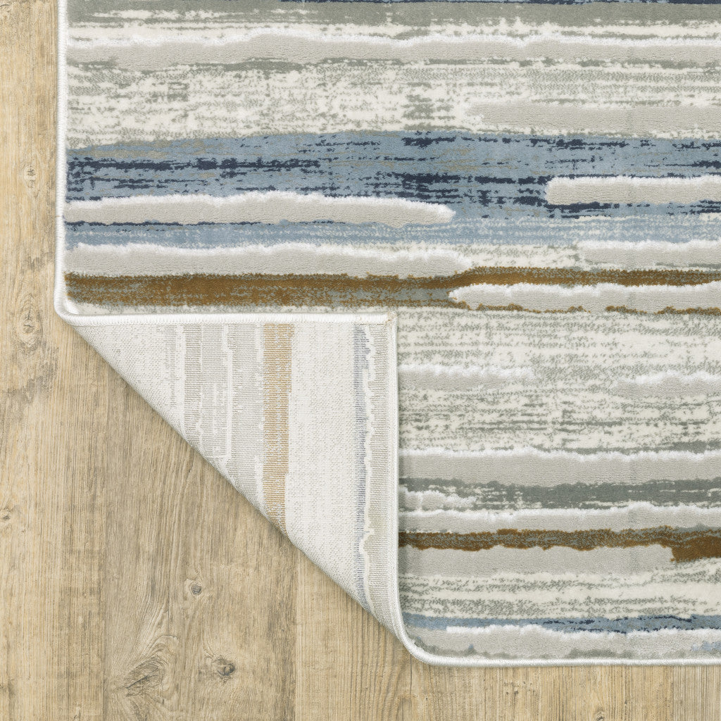 8' X 11' Grey Blue Ivory Brown Beige And Navy Abstract Power Loom Stain Resistant Area Rug