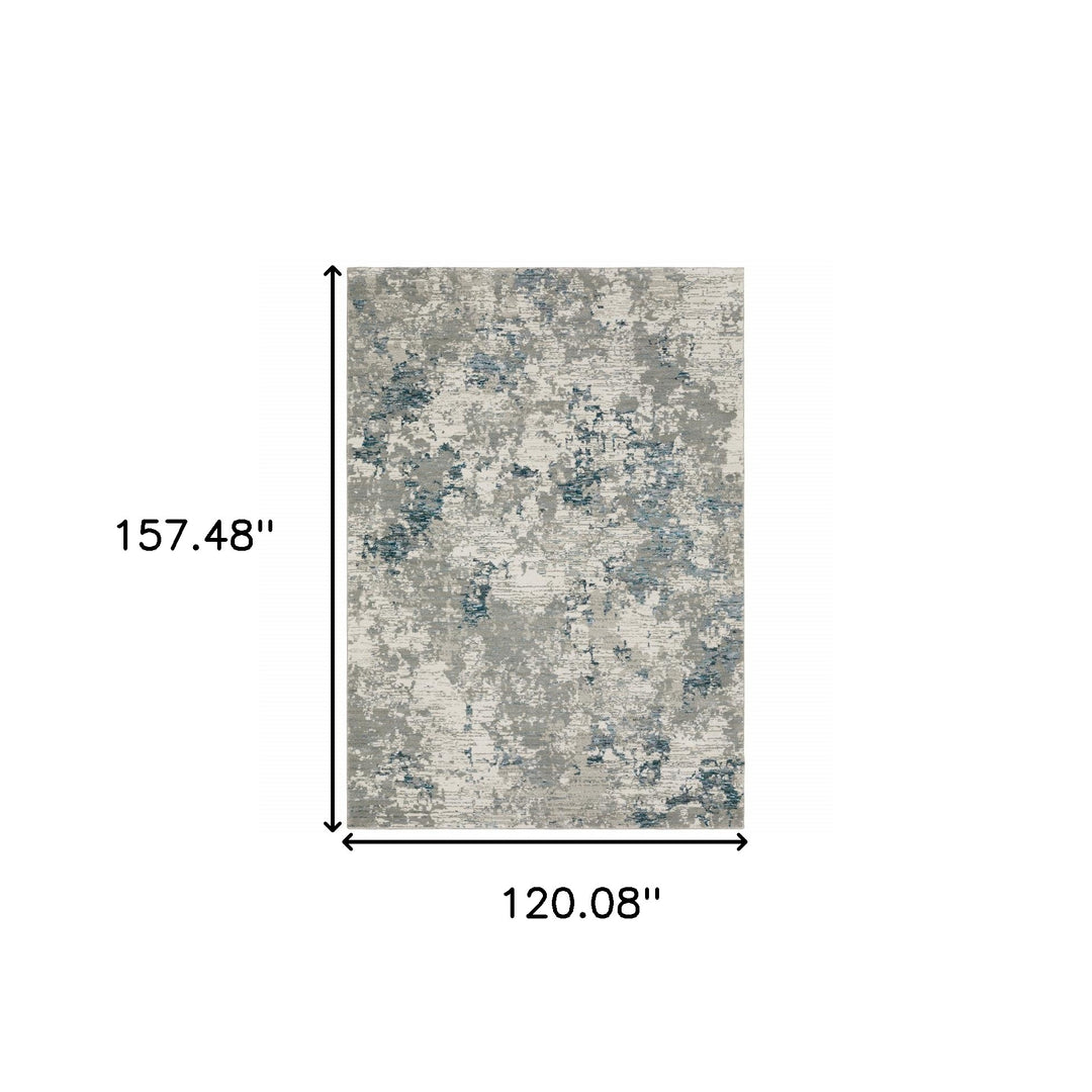 10' X 13' Blue and Beige Abstract Power Loom Area Rug