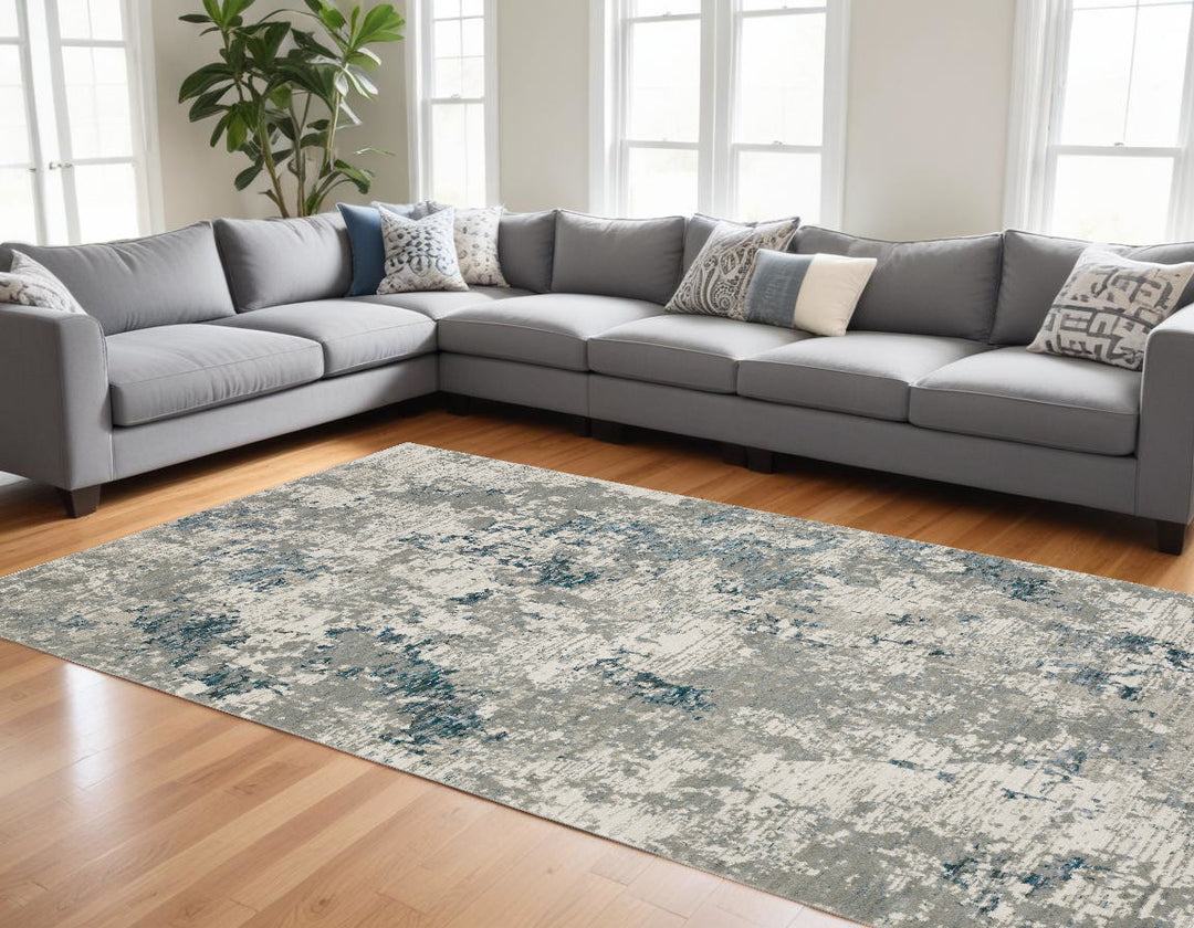 10' X 13' Blue and Beige Abstract Power Loom Area Rug