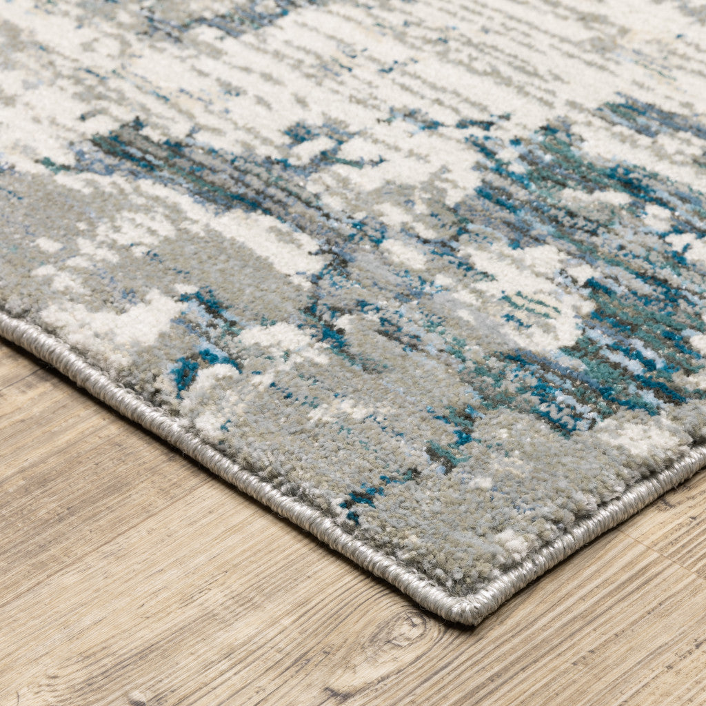 10' X 13' Blue and Beige Abstract Power Loom Area Rug