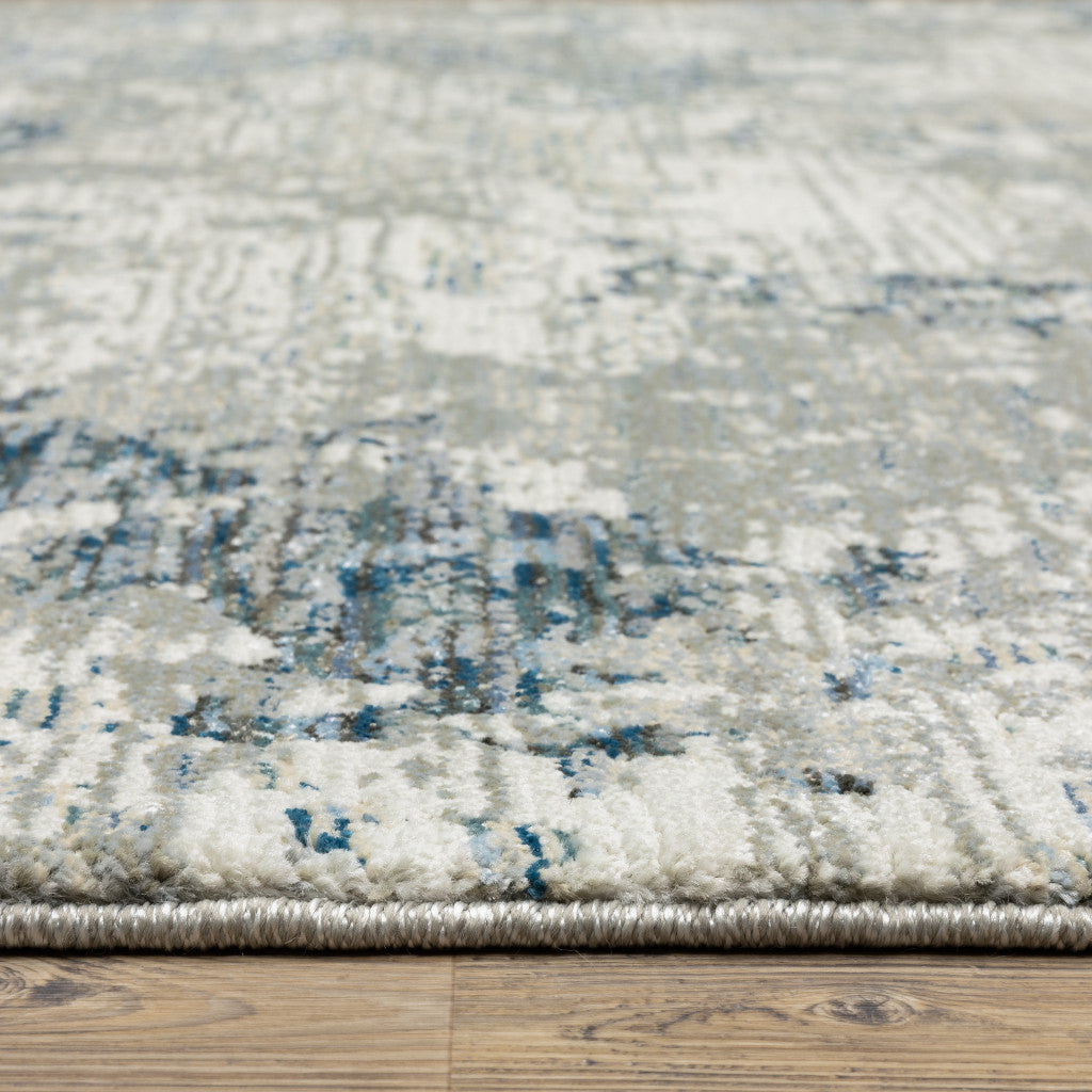 10' X 13' Blue and Beige Abstract Power Loom Area Rug