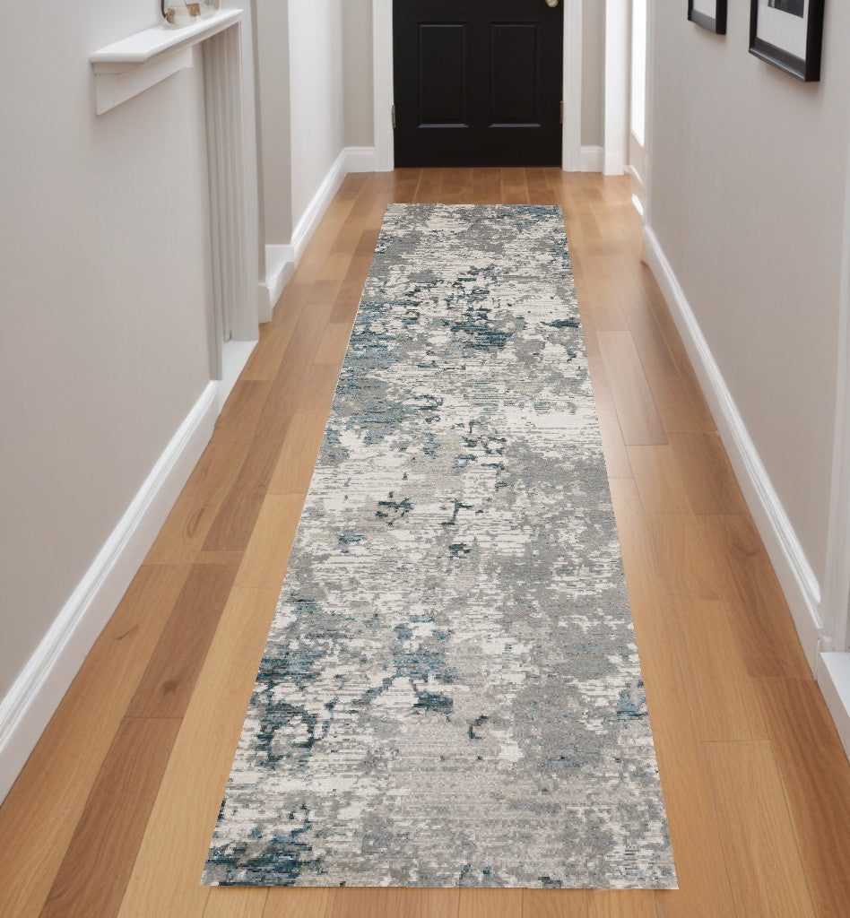 10' X 13' Blue and Beige Abstract Power Loom Area Rug