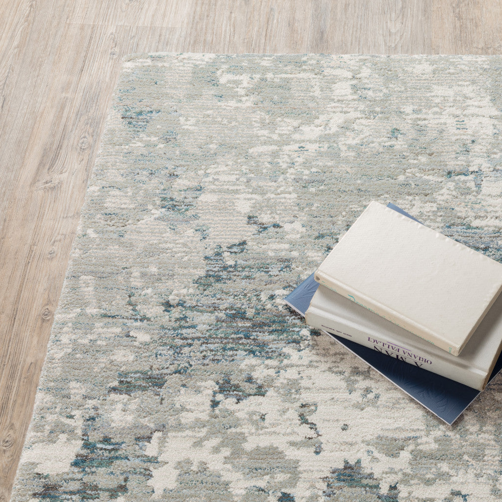 10' X 13' Blue and Beige Abstract Power Loom Area Rug