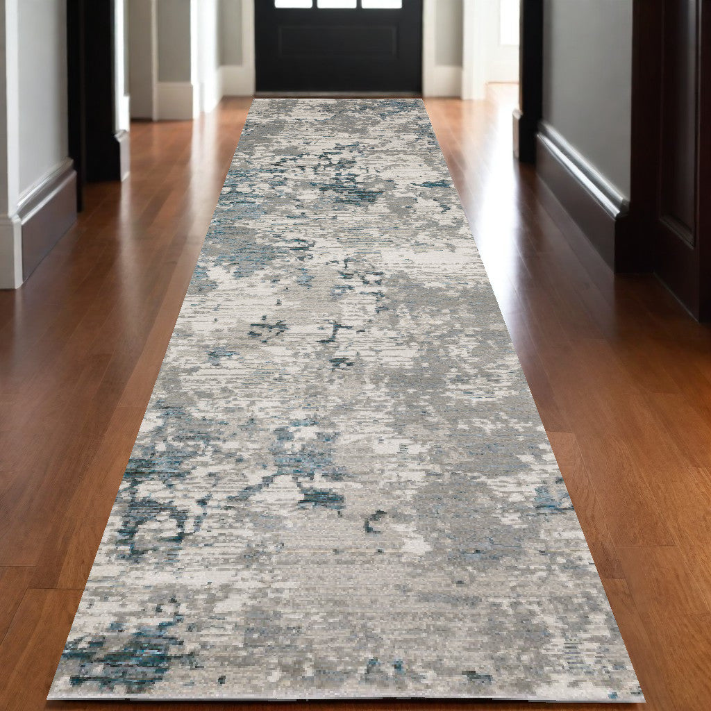 10' X 13' Blue and Beige Abstract Power Loom Area Rug