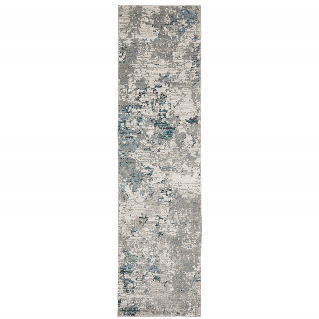 10' X 13' Blue and Beige Abstract Power Loom Area Rug