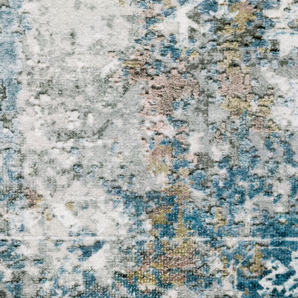 5' X 7' Ivory Teal Blue Grey Brown And Gold Abstract Printed Stain Resistant Non Skid Area Rug