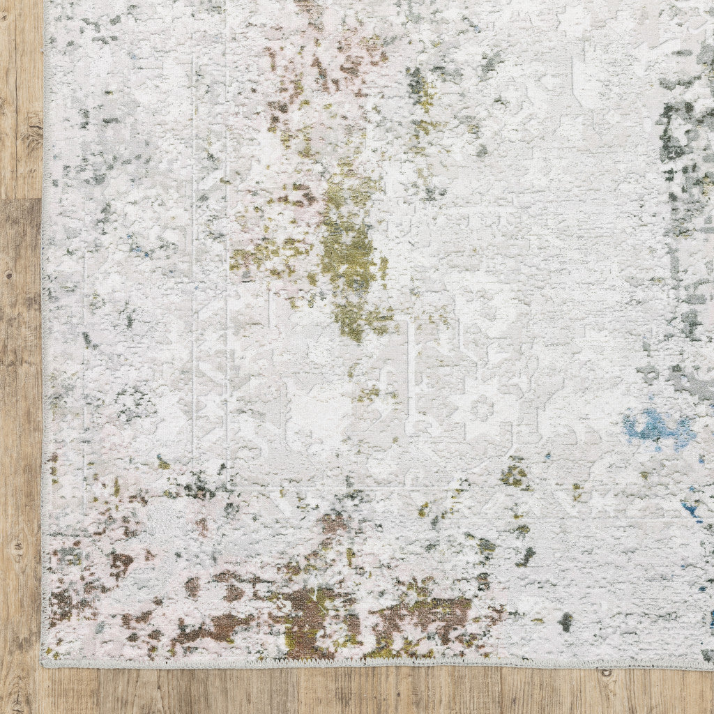 5' X 7' Ivory Teal Blue Grey Brown And Gold Abstract Printed Stain Resistant Non Skid Area Rug