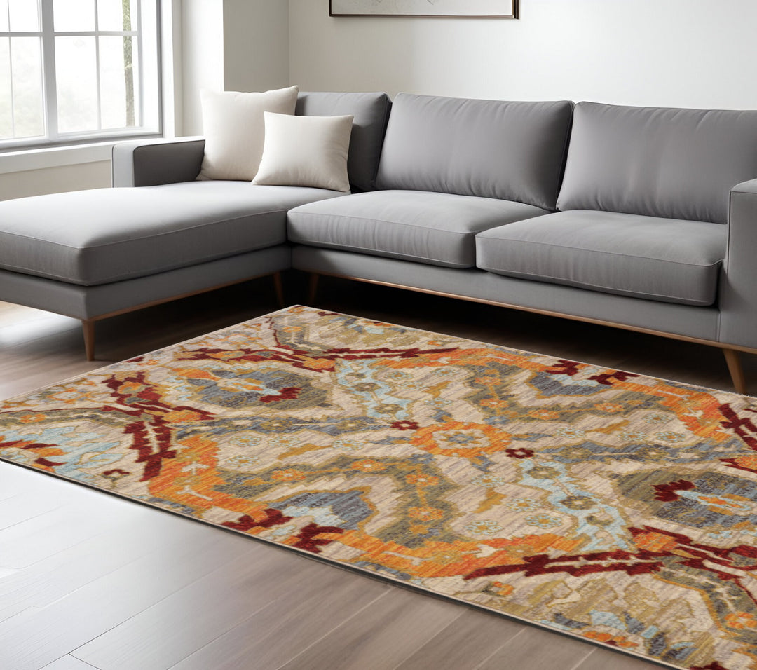 2' X 3' Beige Orange Blue Gold And Grey Abstract Power Loom Stain Resistant Area Rug