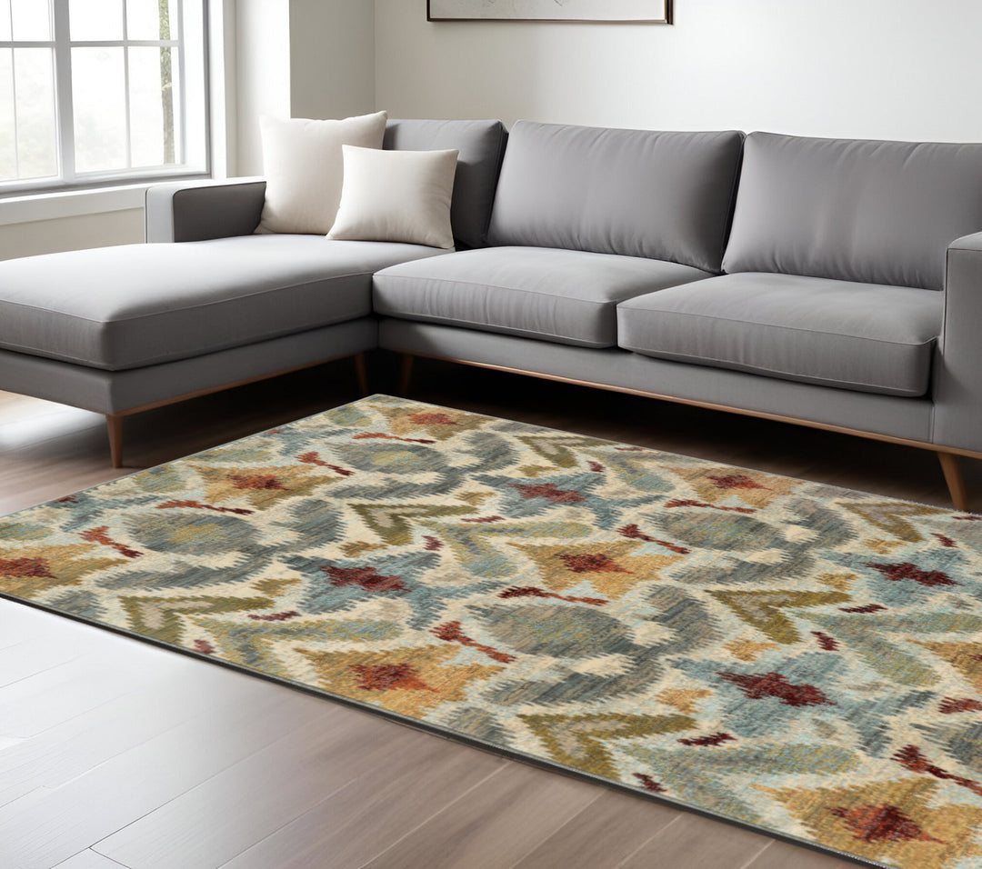 2' X 3' Ivory Grey Rust Gold And Blue Abstract Power Loom Stain Resistant Area Rug