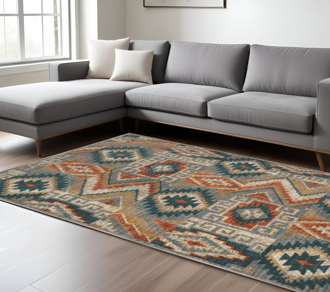 2' X 3' Blue Teal Grey Orange Gold Ivory And Rust Geometric Power Loom Stain Resistant Area Rug