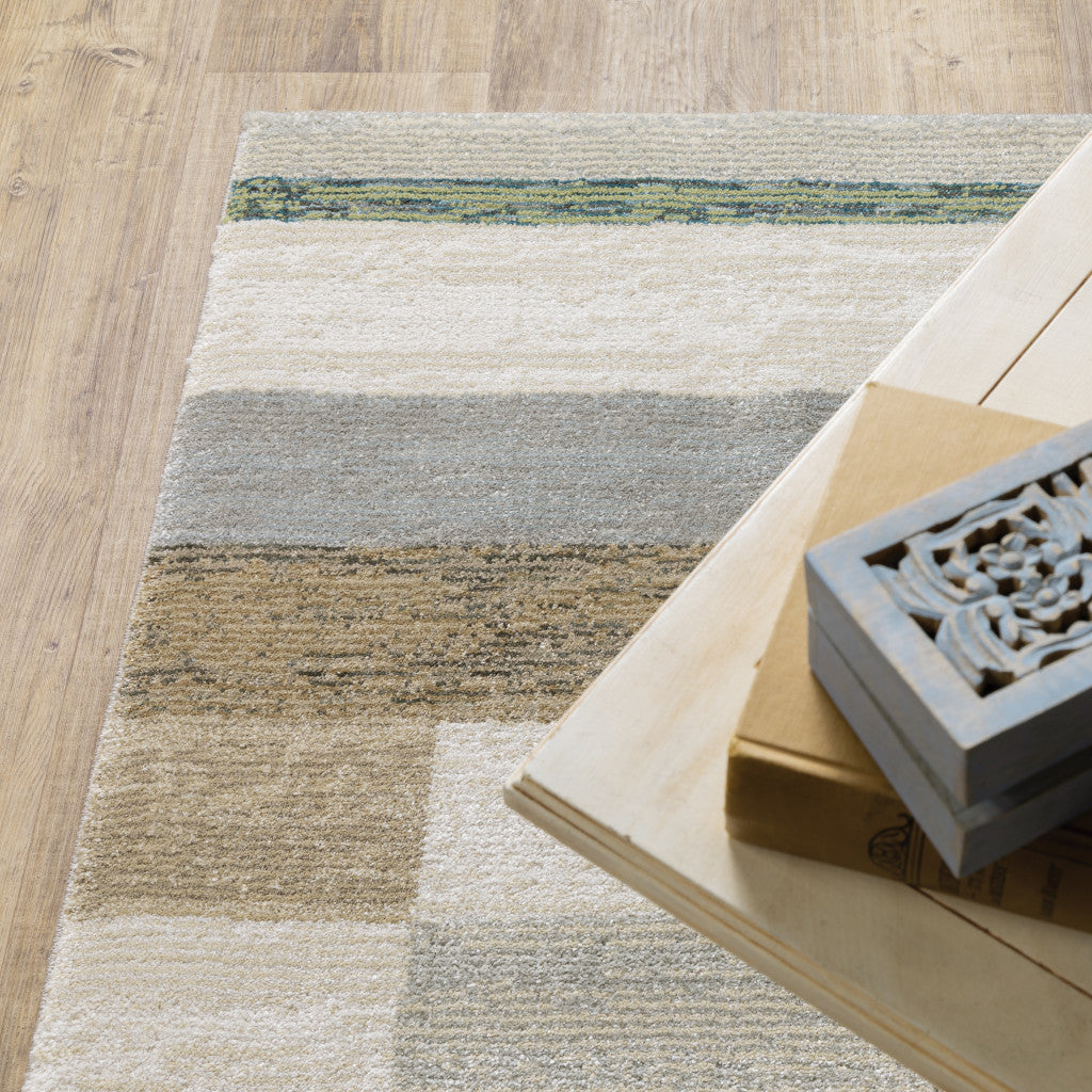 10' X 13' Beige Gold Black Grey Tan Teal and Rust Geometric Power Loom Area Rug