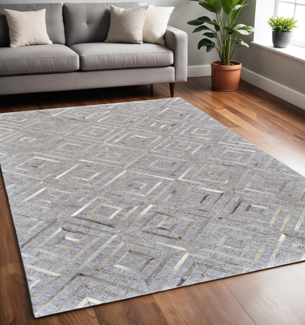 5' X 8' Gray and Ivory Geometric Hand Woven Area Rug