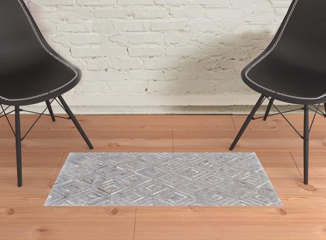 5' X 8' Gray and Ivory Geometric Hand Woven Area Rug