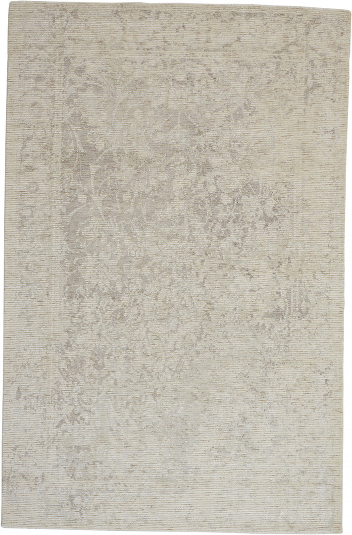 2' X 3' Ivory And Tan Abstract Hand Woven Area Rug