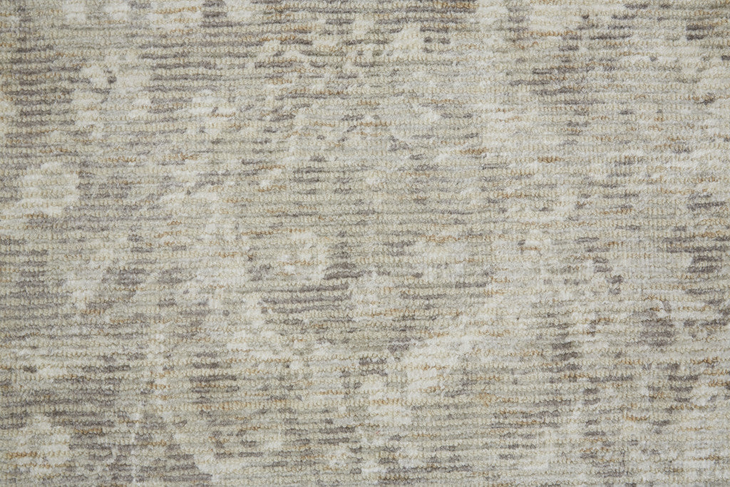 2' X 3' Ivory And Tan Abstract Hand Woven Area Rug