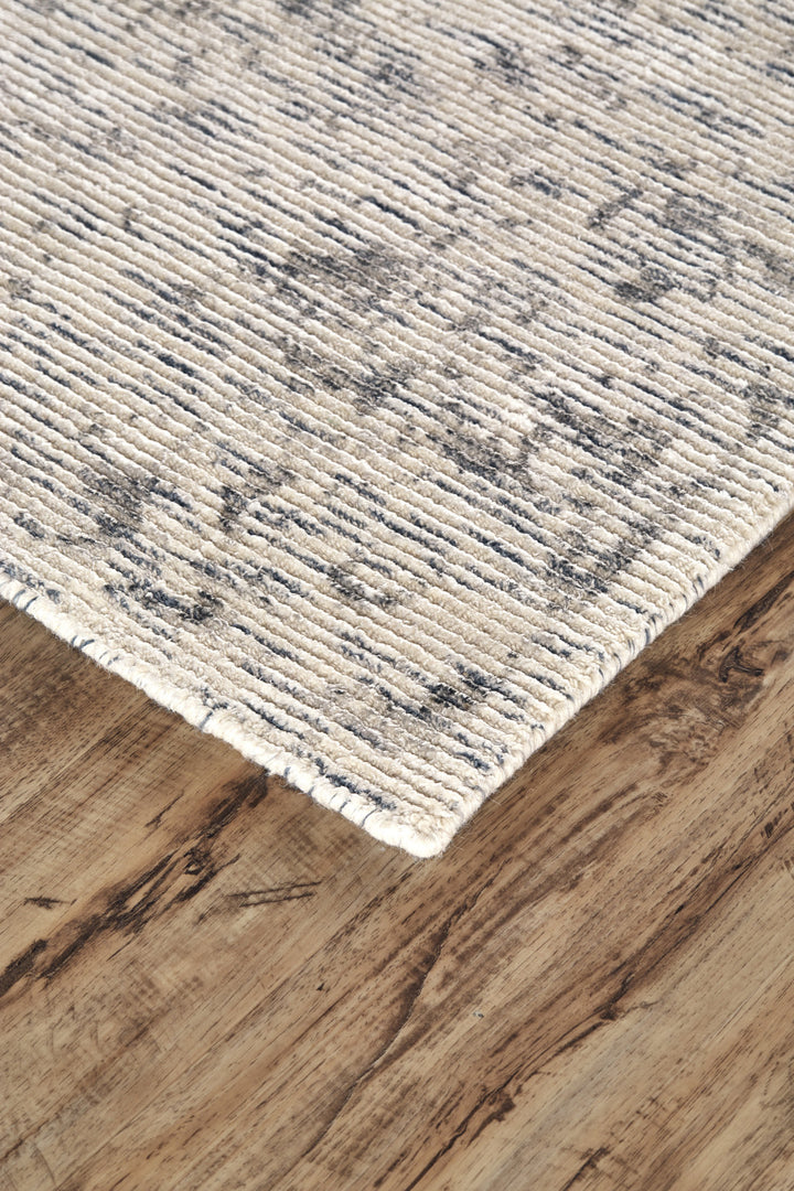 2' X 3' Ivory And Tan Abstract Hand Woven Area Rug