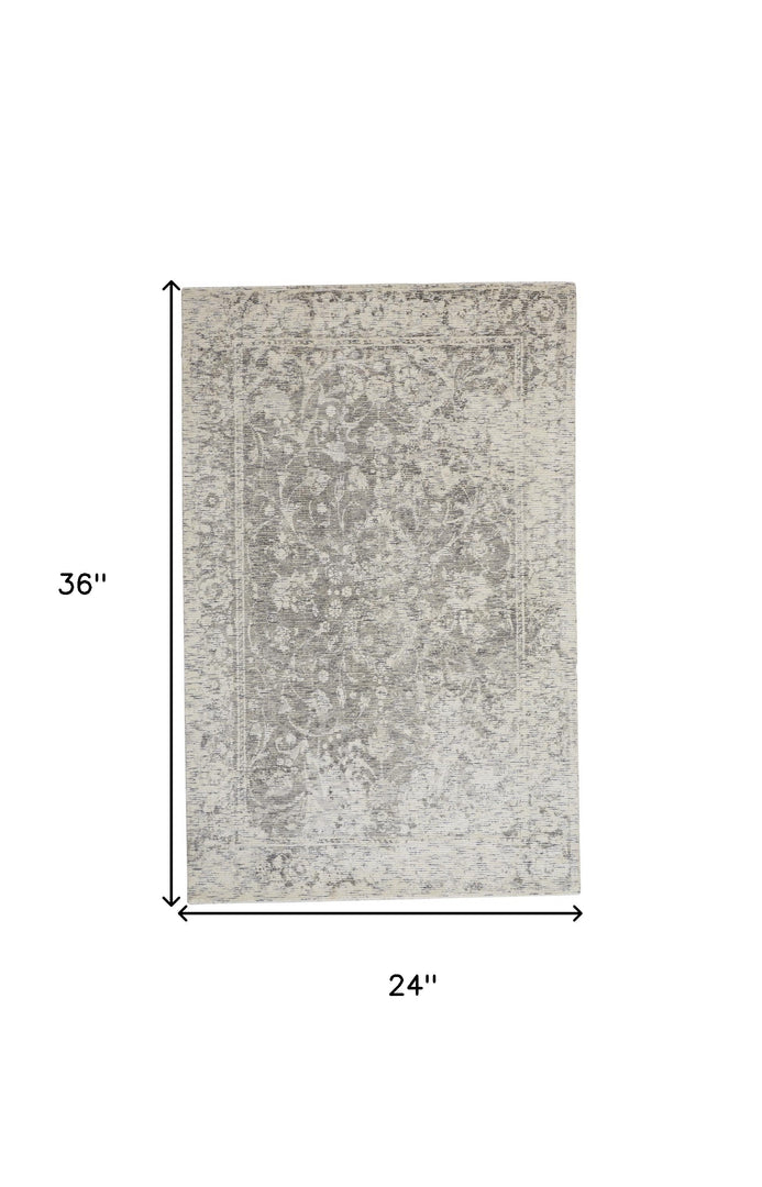 2' X 3' Ivory And Tan Abstract Hand Woven Area Rug