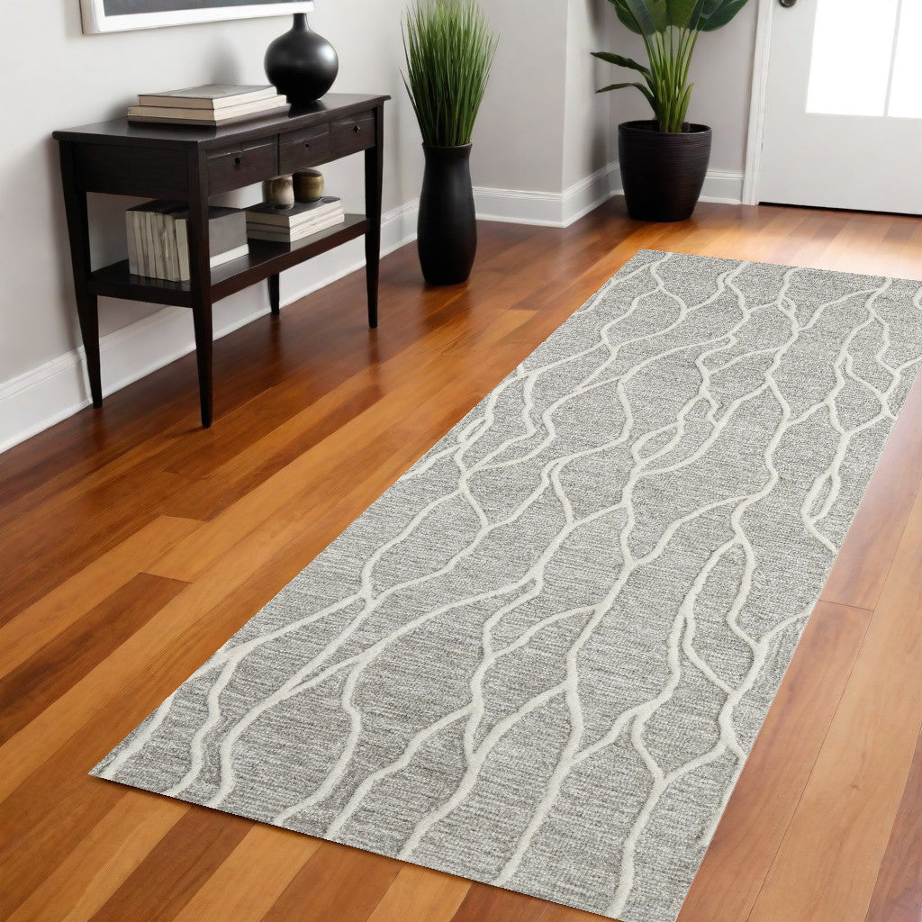 4' X 6' Taupe Black And Gray Wool Abstract Tufted Handmade Stain Resistant Area Rug