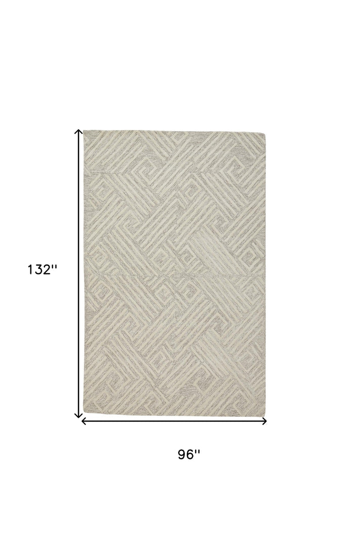 5' X 8' Tan And Ivory Wool Geometric Tufted Handmade Stain Resistant Area Rug