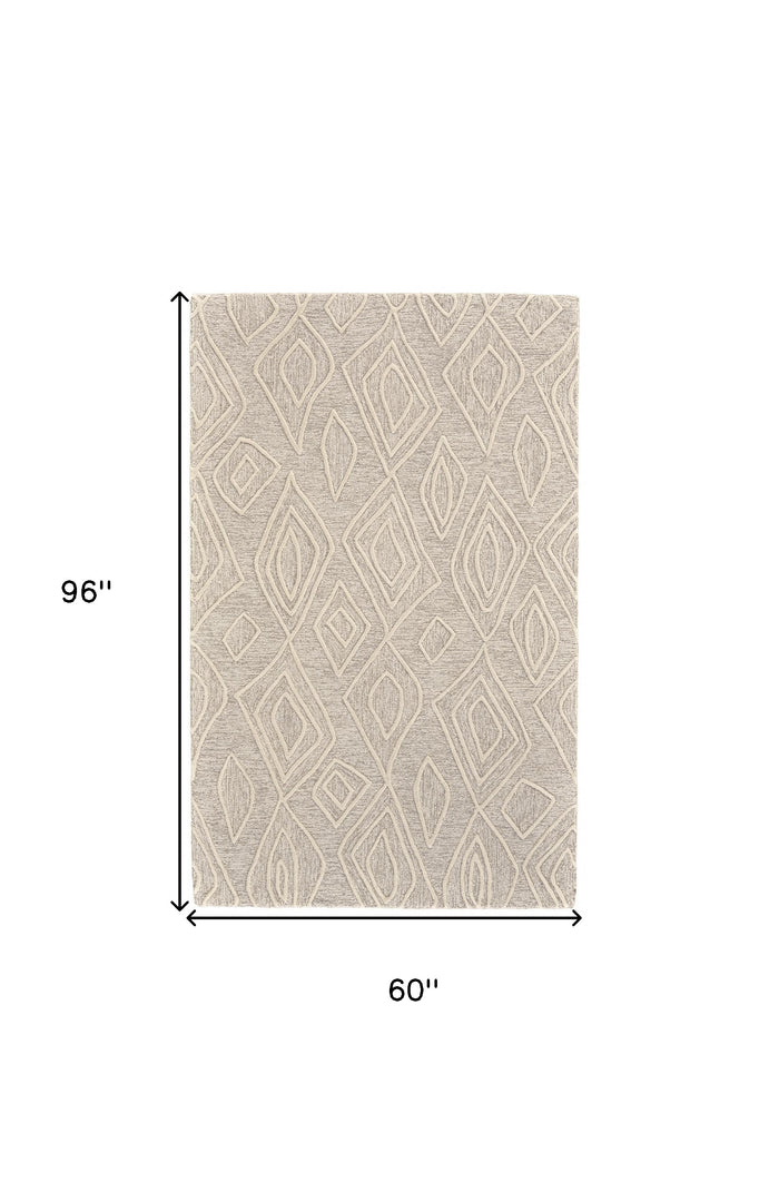 4' X 6' Tan And Ivory Wool Geometric Tufted Handmade Stain Resistant Area Rug