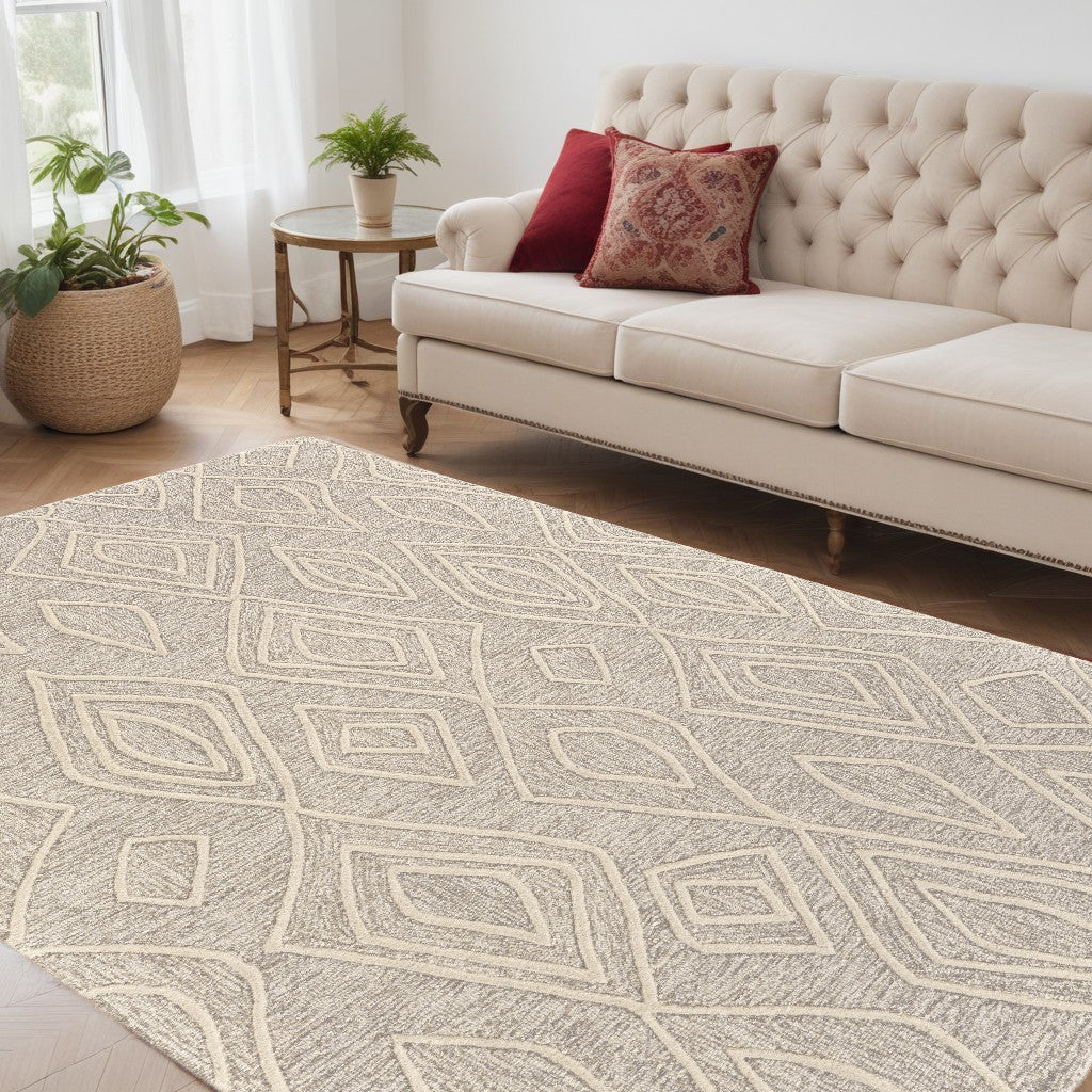 4' X 6' Tan And Ivory Wool Geometric Tufted Handmade Stain Resistant Area Rug