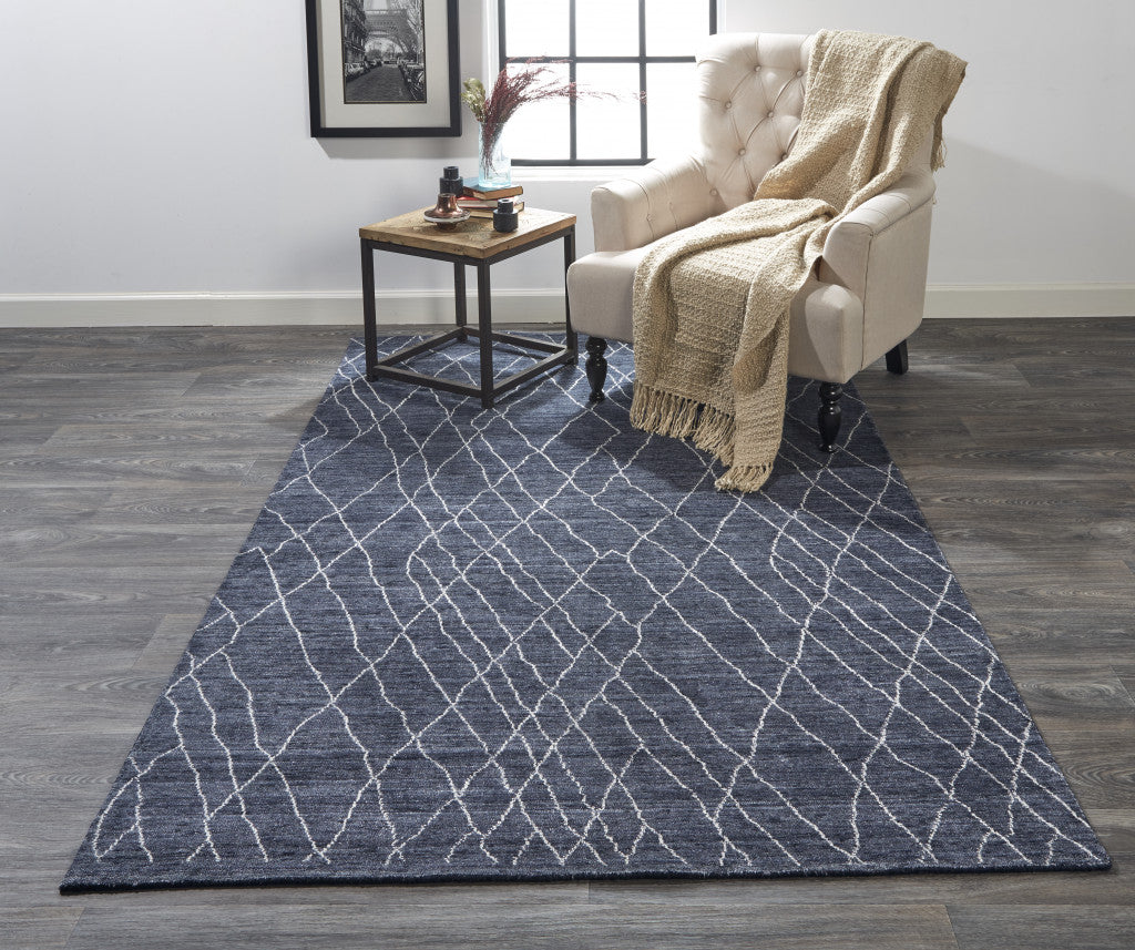 8' X 10' Blue And Ivory Abstract Hand Woven Area Rug