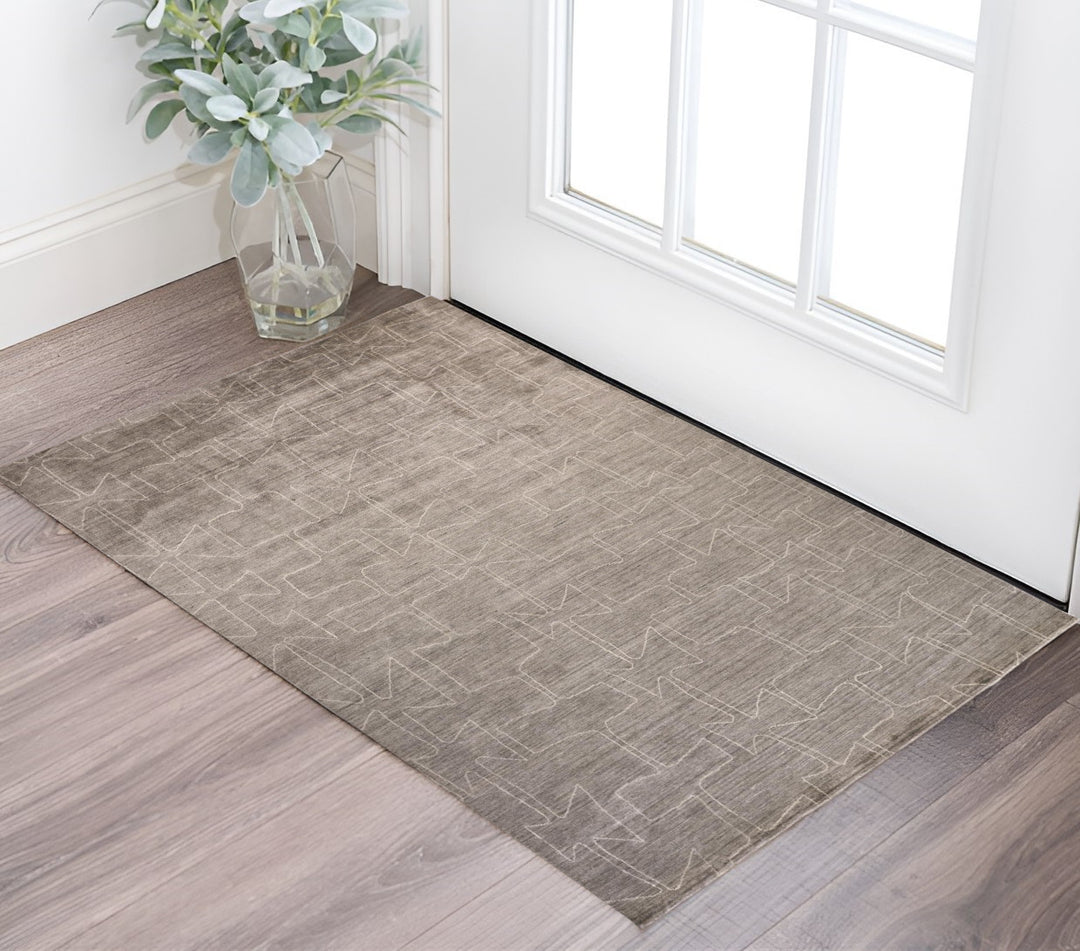 4' X 6' Gray and Ivory Abstract Hand Woven Area Rug