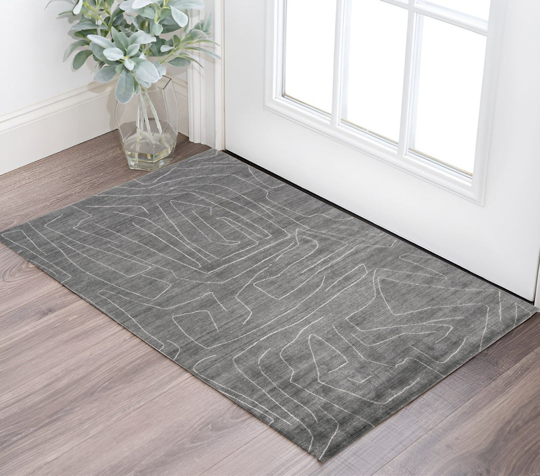 2' X 3' Gray and Ivory Abstract Hand Woven Area Rug