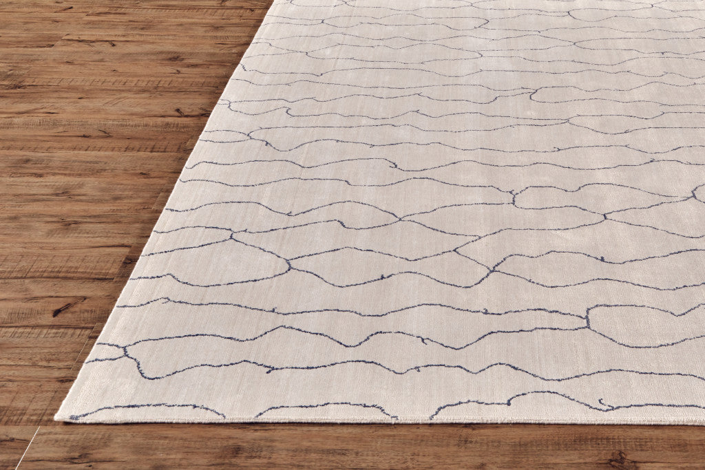 4' X 6' Gray and Ivory Abstract Hand Woven Area Rug