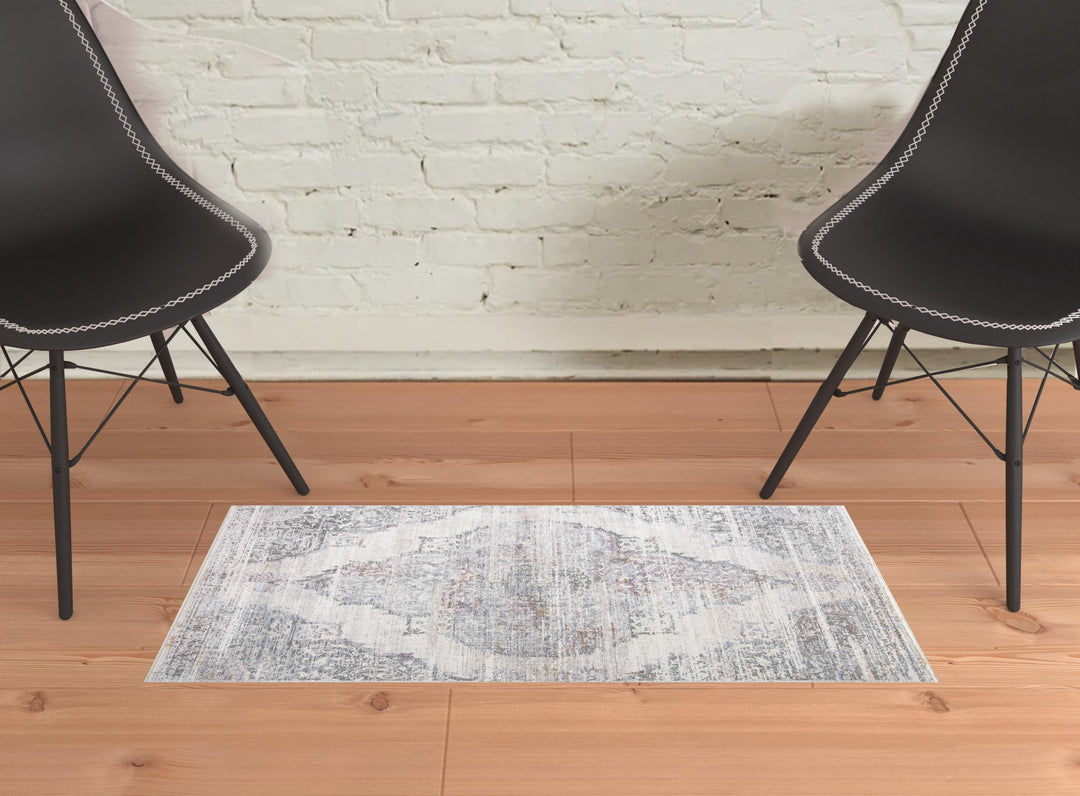 3' X 5' Gray and Ivory Abstract Distressed Area Rug With Fringe