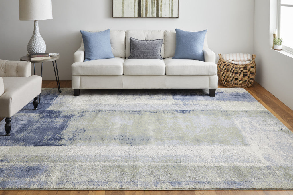 4' X 6' Blue and Ivory Abstract Power Loom Distressed Area Rug