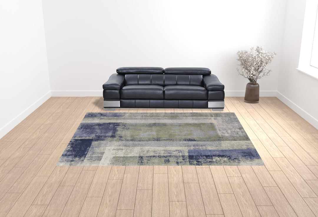 4' X 6' Blue and Ivory Abstract Power Loom Distressed Area Rug