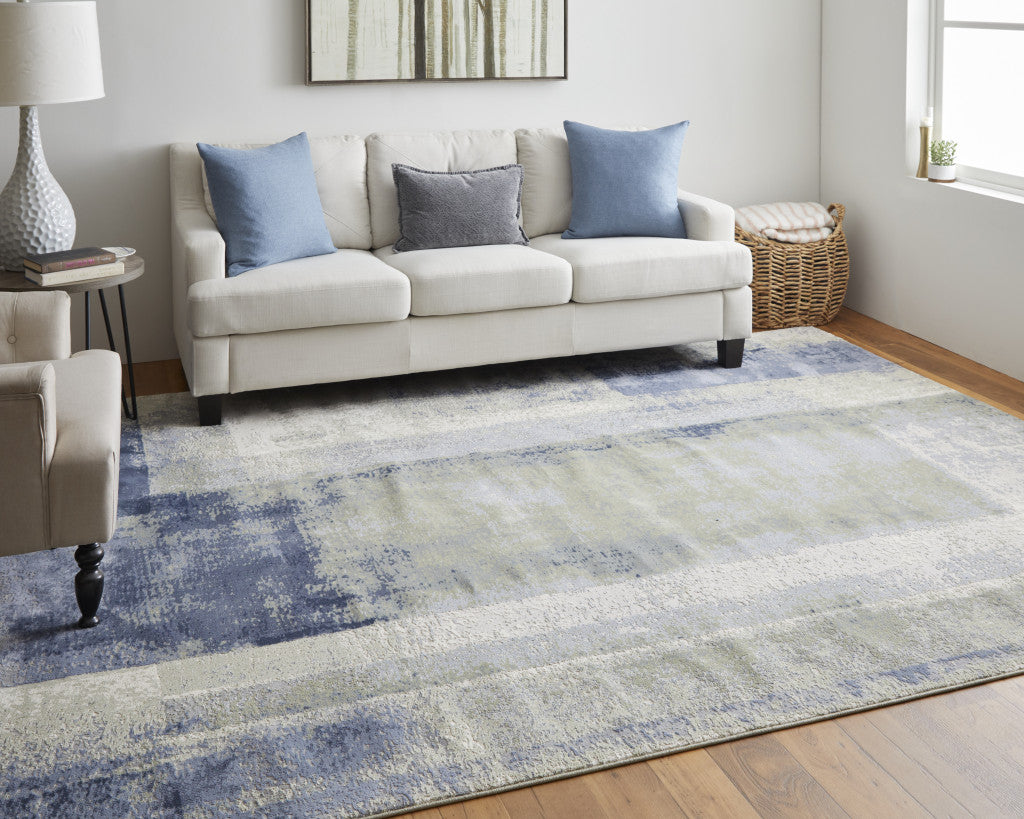 4' X 6' Blue and Ivory Abstract Power Loom Distressed Area Rug