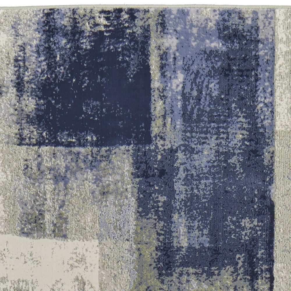 4' X 6' Blue and Ivory Abstract Power Loom Distressed Area Rug