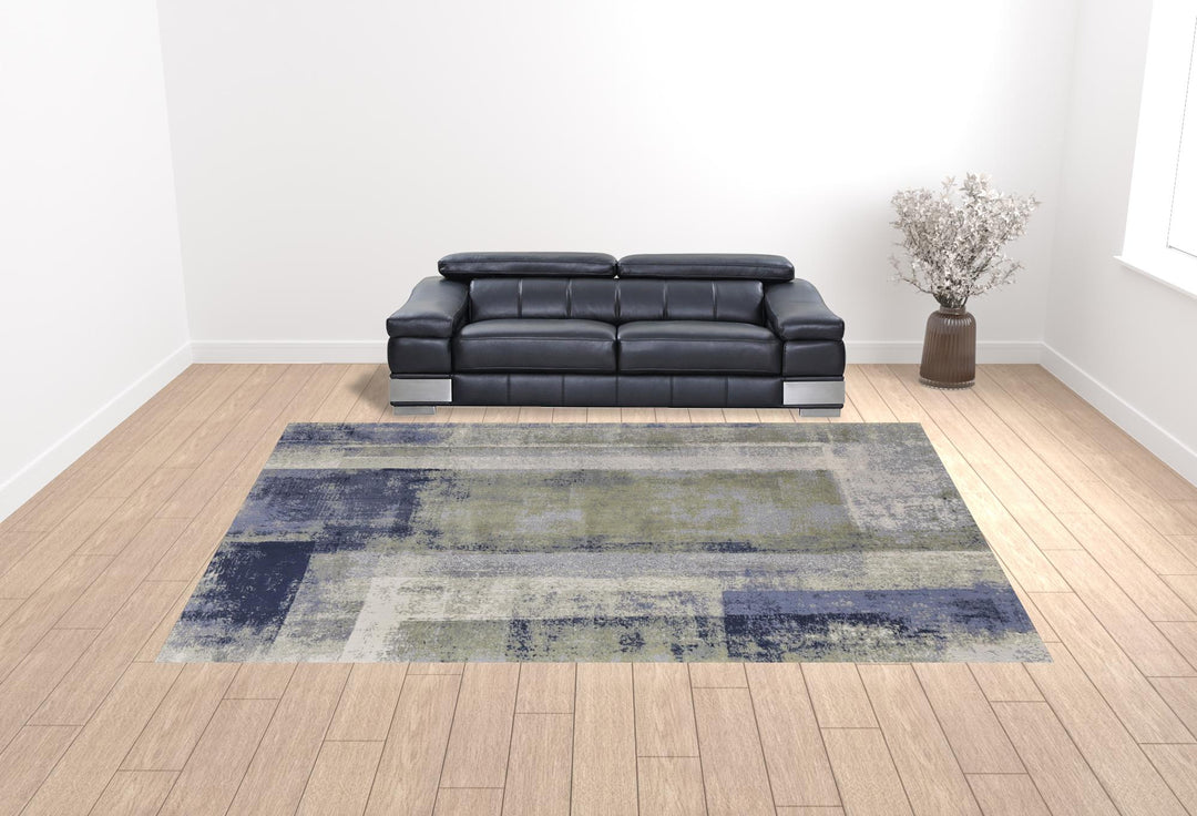 4' X 6' Blue and Ivory Abstract Power Loom Distressed Area Rug