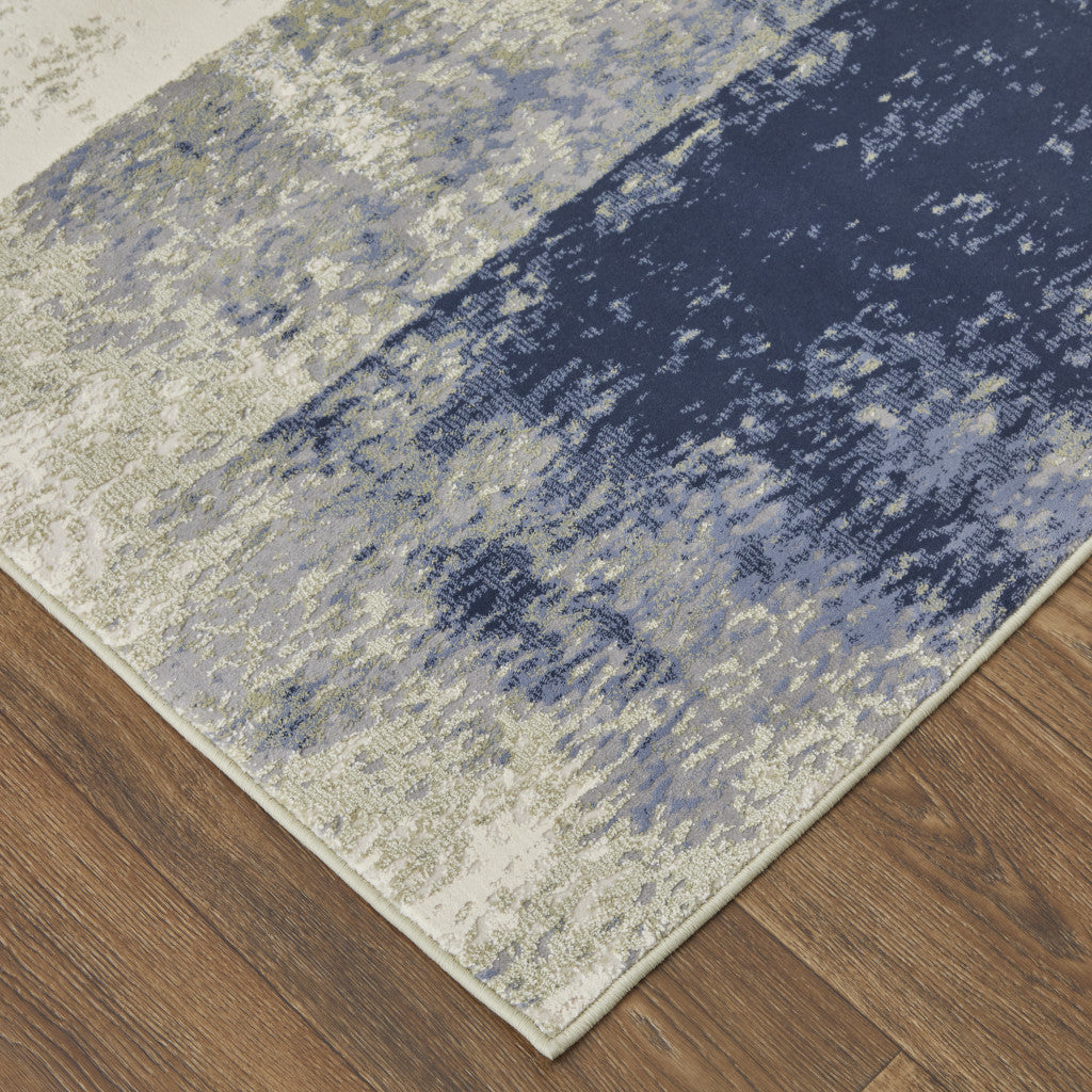 4' X 6' Blue and Ivory Abstract Power Loom Distressed Area Rug