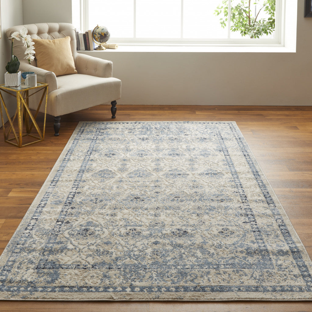 8' X 10' Blue And Ivory Geometric Power Loom Distressed Area Rug