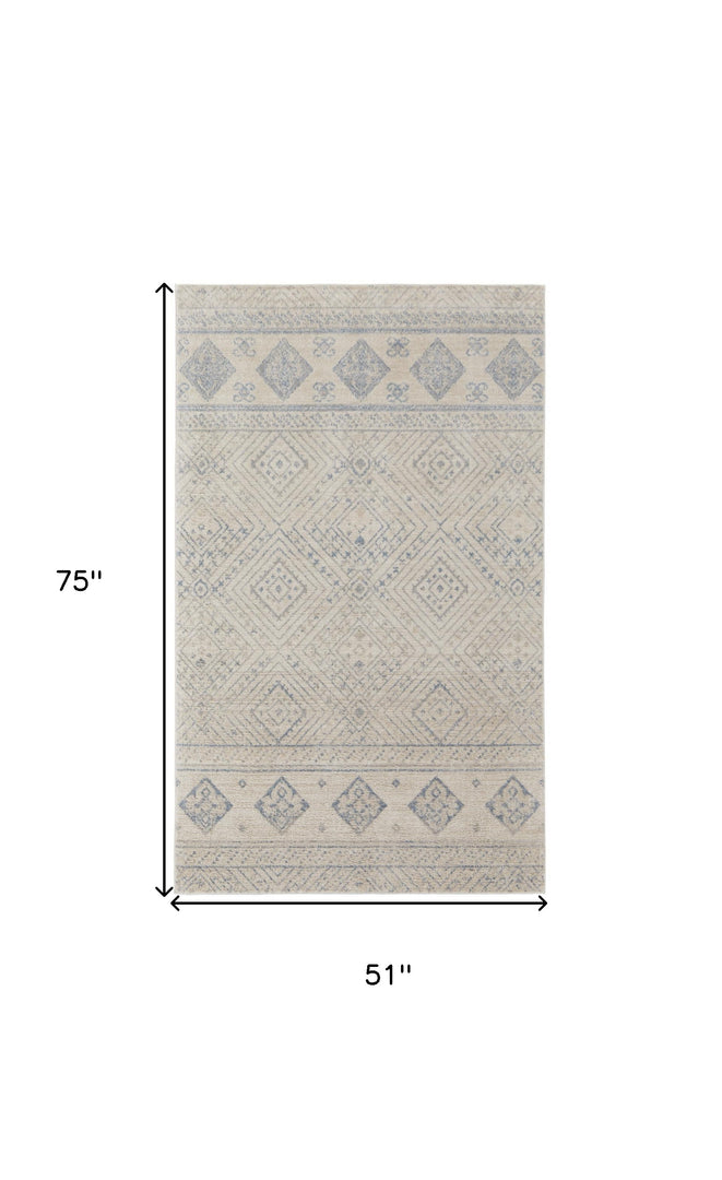 4' X 6' Ivory And Blue Geometric Power Loom Distressed Area Rug