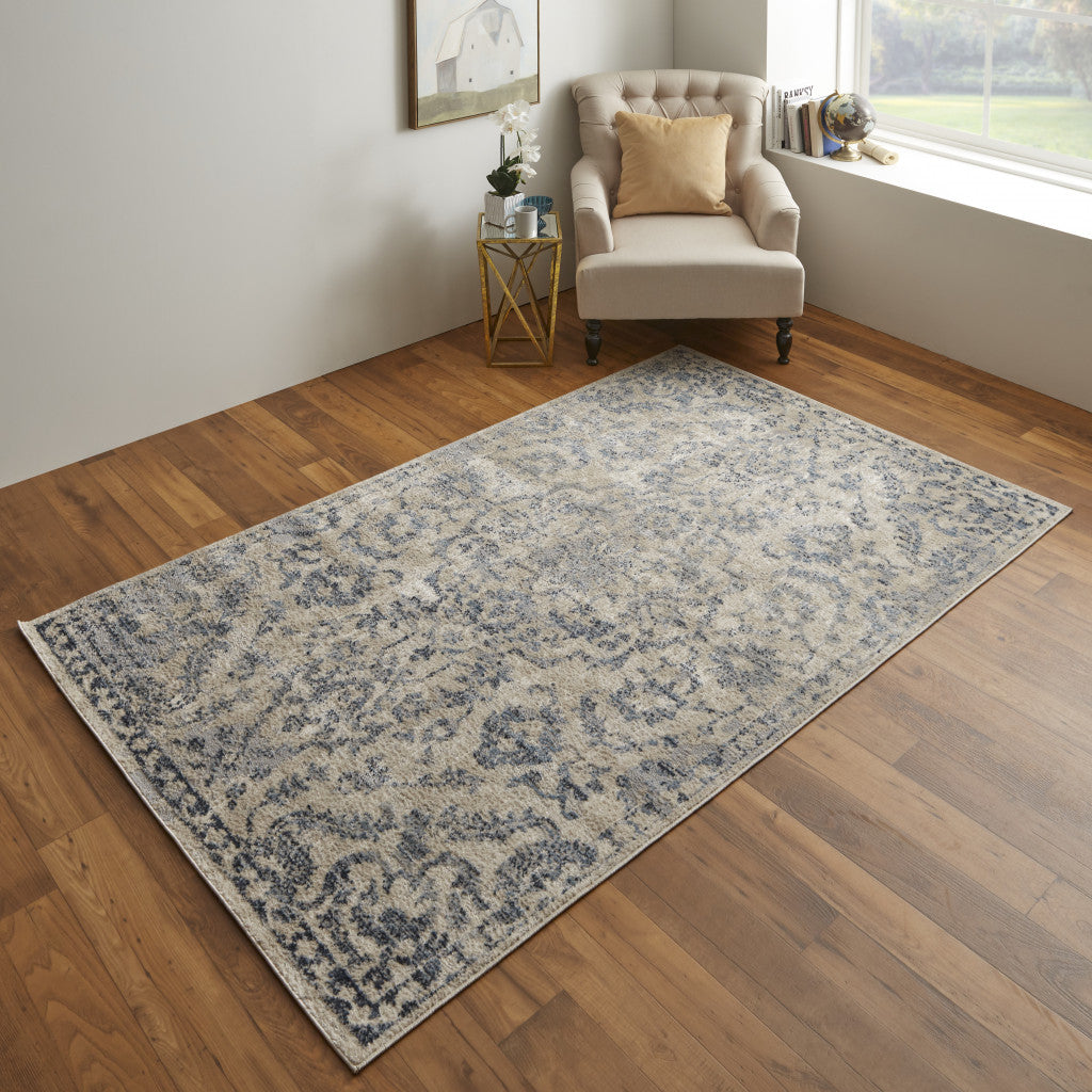 8' X 10' Blue Gray And Ivory Floral Power Loom Distressed Area Rug