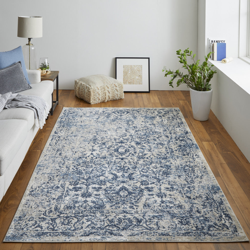 8' X 10' Blue And Ivory Floral Power Loom Distressed Area Rug