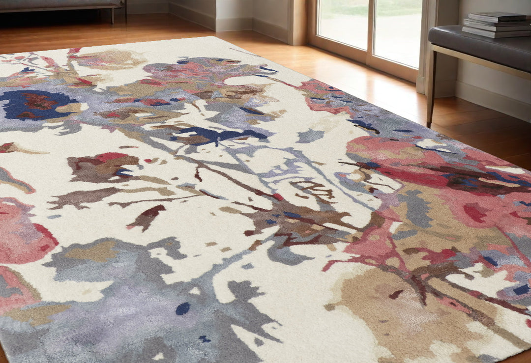 4' X 6' Ivory and Blue Wool Floral Hand Tufted Area Rug