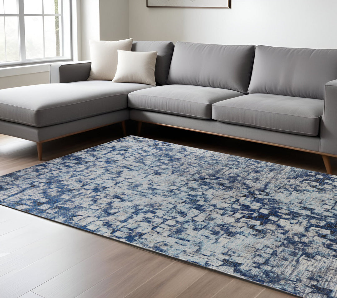 3' X 5' Blue And Ivory Abstract Power Loom Distressed Stain Resistant Area Rug