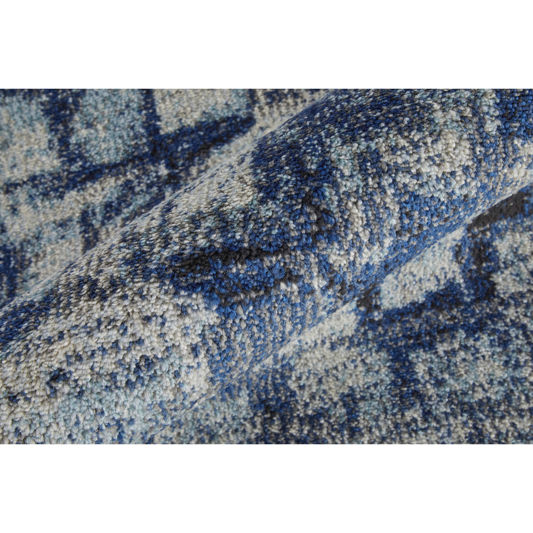 3' X 5' Blue And Ivory Abstract Power Loom Distressed Stain Resistant Area Rug