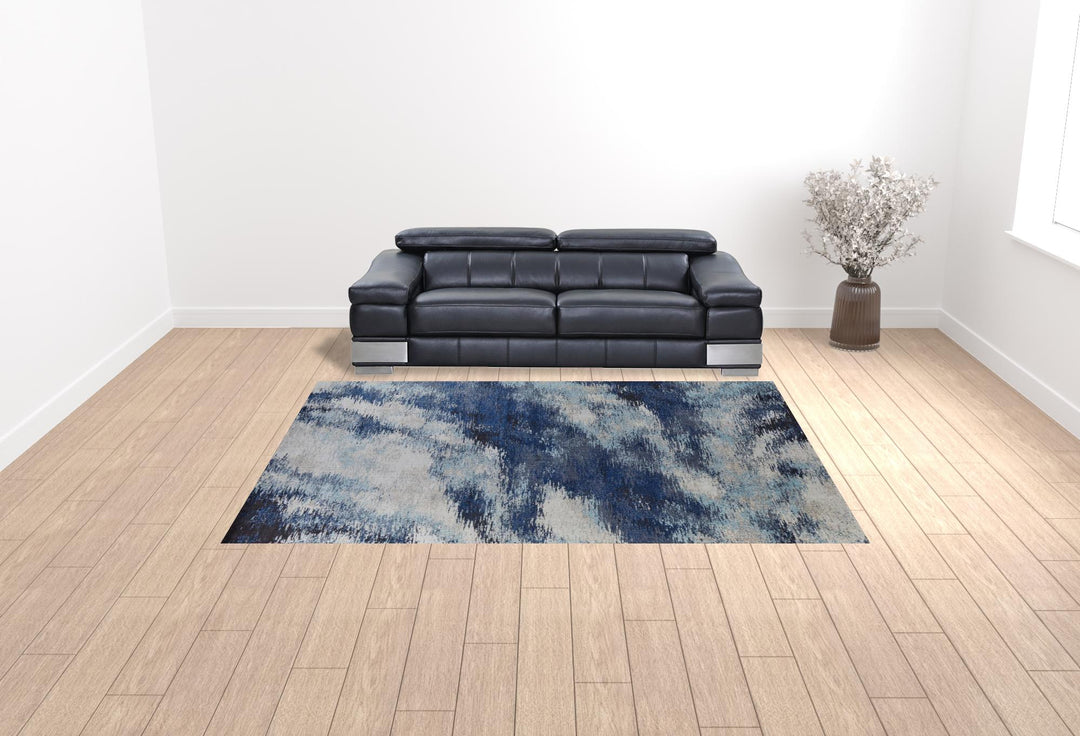 3' X 5' Blue And Ivory Abstract Power Loom Stain Resistant Area Rug