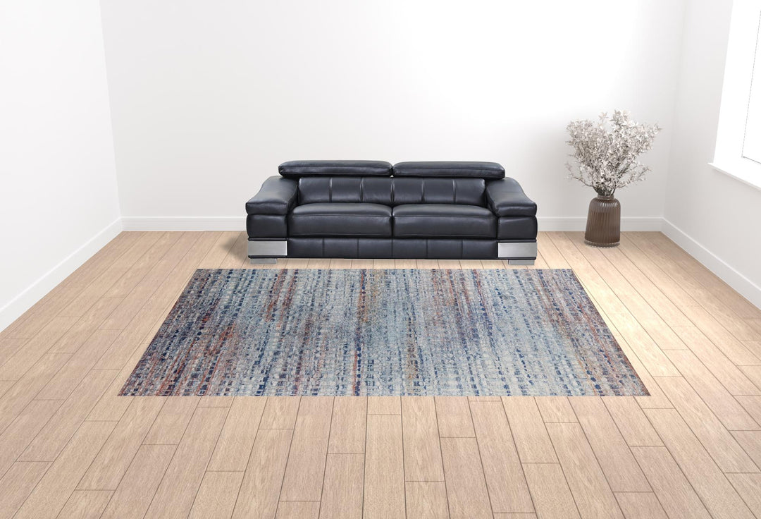 3' X 5' Blue Ivory And Orange Abstract Power Loom Stain Resistant Area Rug