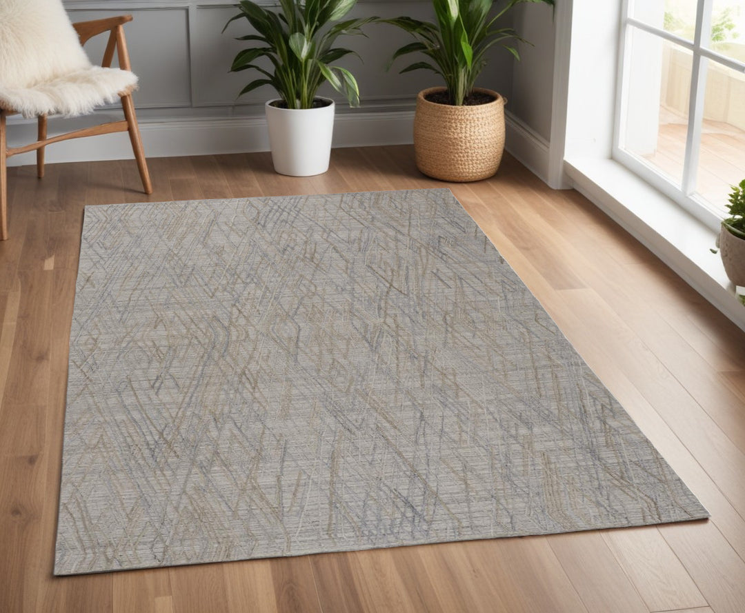 4' X 6' Gray And Ivory Abstract Hand Woven Area Rug